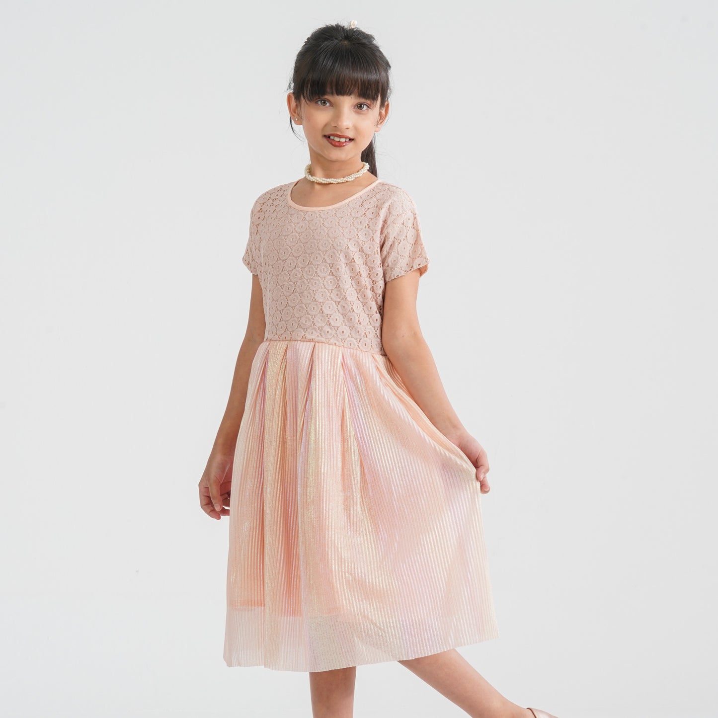 Girl’s Peach Pleated Gown