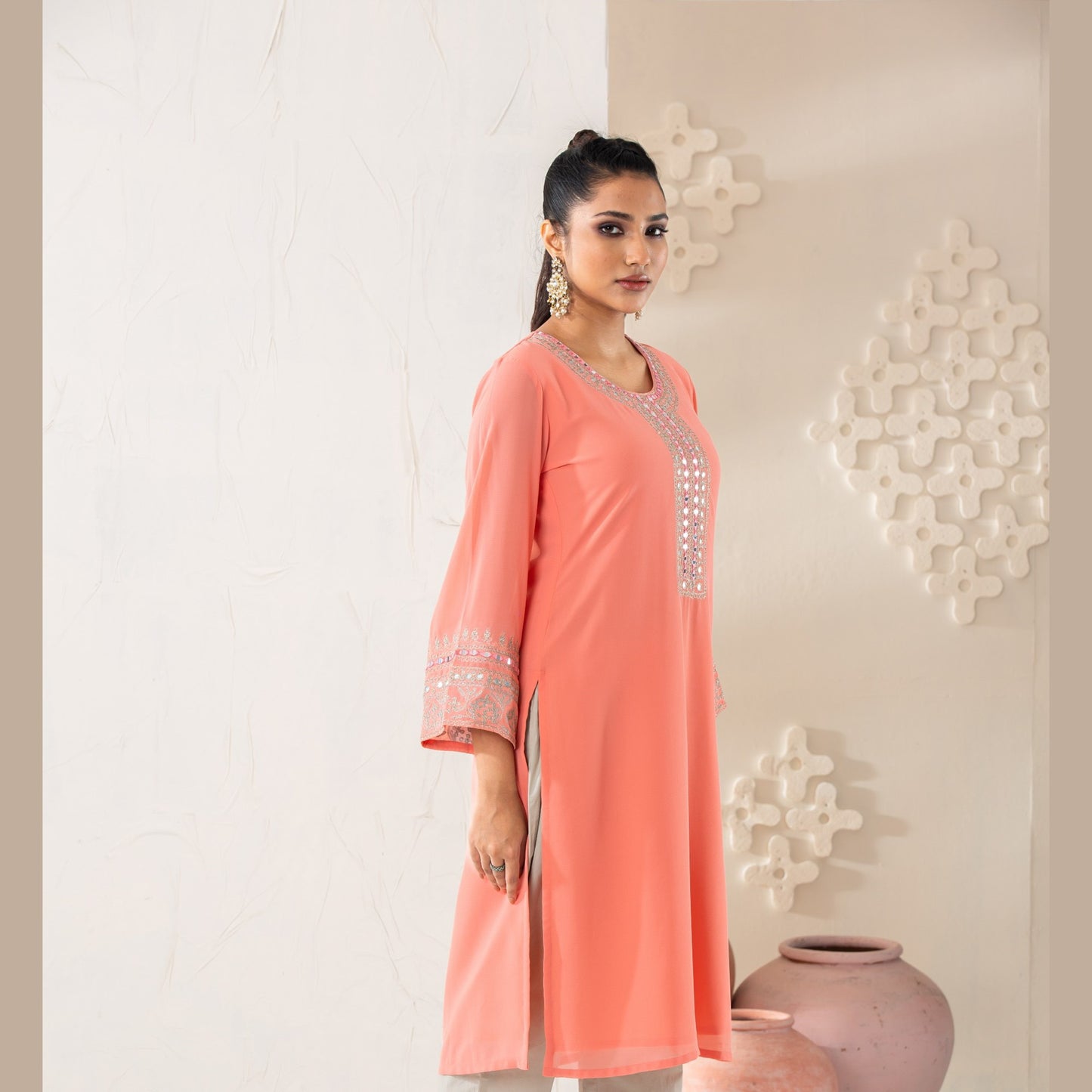 Women Peach Embroidered Kurti